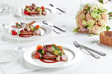 Steak on the bone. tomahawk steak On a white background. Top view. Free copy space.
