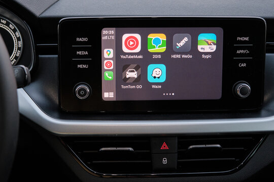 Apple CarPlay screen in the car dashboard. Youtube music, Waze, 2GIS, Here WeGo, Sygic, TomTom Go logo on the screen in the automobile, August 2020, San Francisco, USA 