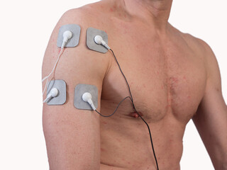 Close-up Of Person With Electrodes On Shoulder