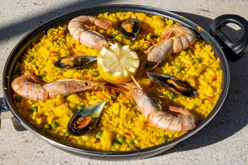 Paella  with prawn, mussels and rice.  Traditional spanish food paella.