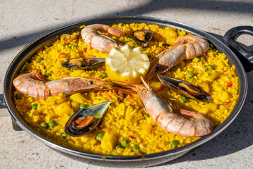 Paella  with prawn, mussels and rice.  Traditional spanish food paella.