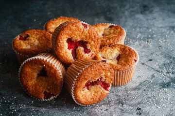 Delicious muffins with raspberries. Muffins on the table