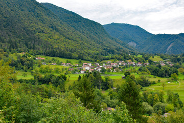 Obraz premium The summer landscape near the village of Zatolmin in Tolmin municipality, Primorska, Slovenia. Part of the Triglav National Park 