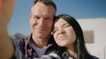 POV selfie of motorhome couple smile and kiss. Rbbro Traveler woman and man look at phone pose. Headshot portrait of friends on vacation road trip stand outside and make photo. Concept outdoor, summer - Powered by Adobe