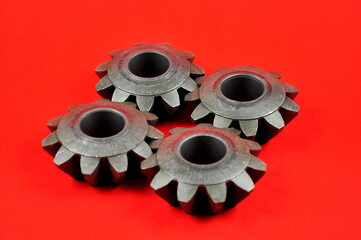 The metal cogwheels connected together. Mechanical components of the car.