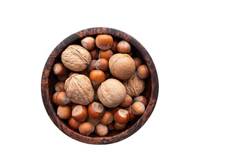 Various nuts in wooden bowl on white background