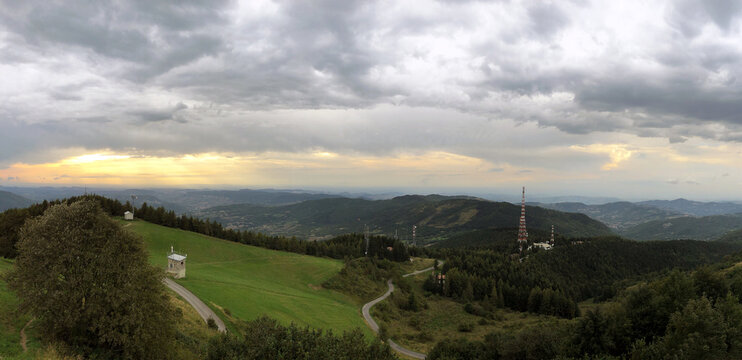 Panorama of cloudy countryside on Monte Penice peak, Lombardia, Italy