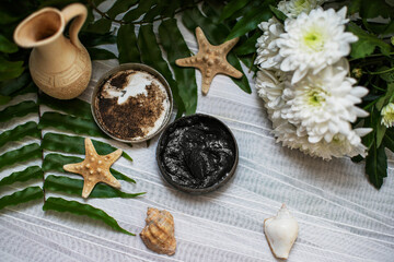 image of homemade cosmetics ingredients. aroma theme. Black mask, clay.