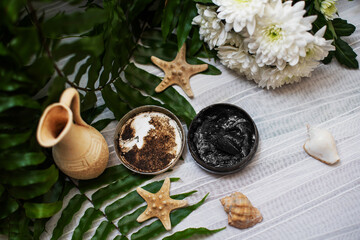 Obraz na płótnie Canvas image of homemade cosmetics ingredients. aroma theme. Black mask, clay.