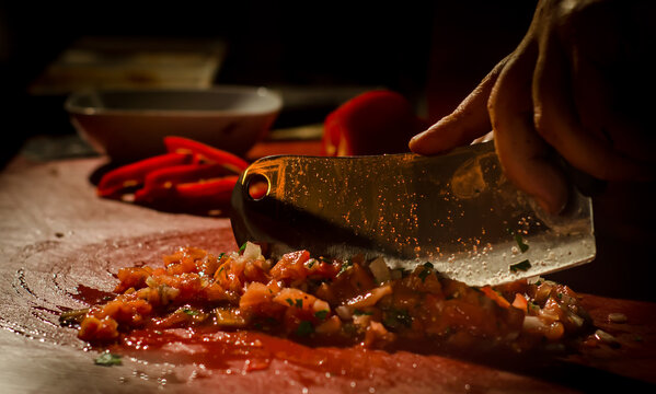cutting salad and meat