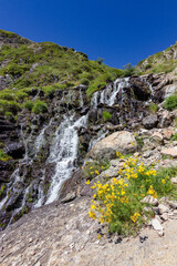 Waterfall in the lakes of Ayous near the Midi d'Ossau mountain in the Pyrenees (France)