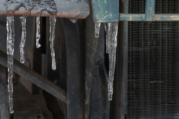 Icicles on an vintage truck.  Cold and icy.  Macro.