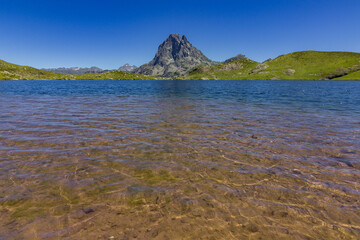 Fototapeta na wymiar View of Ayous lakes and Midi d'Ossau mountain in the Pyrenees (France)