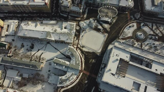 city center with a beautiful ferris wheel, top view
