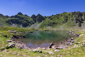 View of Ayous lakes and Midi d'Ossau mountain in the Pyrenees (France)