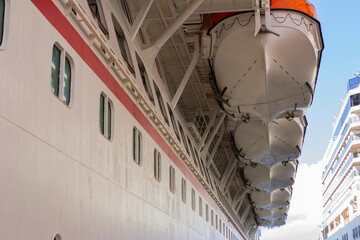Cruise ship in port. Rescue boats 