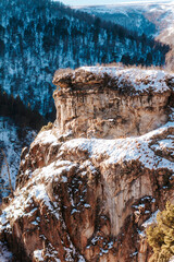 Fototapeta na wymiar Beautiful landscape of snowy rocks. Snow mountain close up. 
