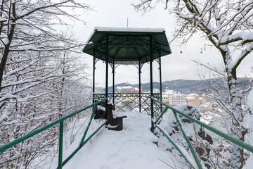 Stunning scenic view of beautiful cityscape of medieval Loket nad Ohri town with Loket Castle gothic style on massive rock, colorful buildings during winter season, Karlovy Vary Region, Czech Republic