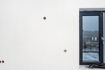 Freshly laid gypsum on the walls and ceiling of a newly built detached house.