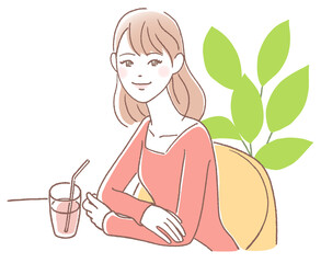 カフェで休憩する若い女性
