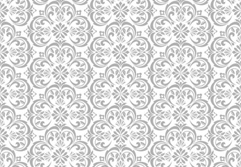 Floral pattern. Vintage wallpaper in the Baroque style. Seamless vector background. White and gray ornament for fabric, wallpaper, packaging. Ornate Damask flower ornament.