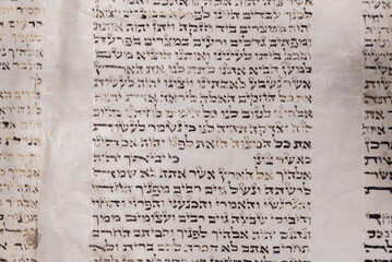 Old Bible scrolls lie on a black background. Religion. Bible. Bible books. Christianity. God....