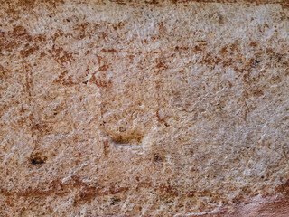 Real sandstone texture. Beige brown natural textured stone pattern on the wall