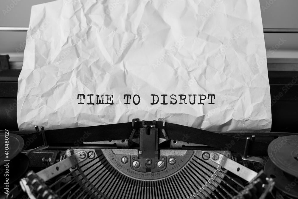 Fototapete text time to disrupt typed on retro typewriter