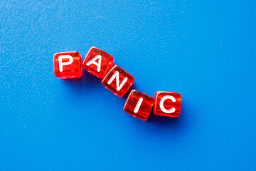 the word panic is composed of letters on a blue background