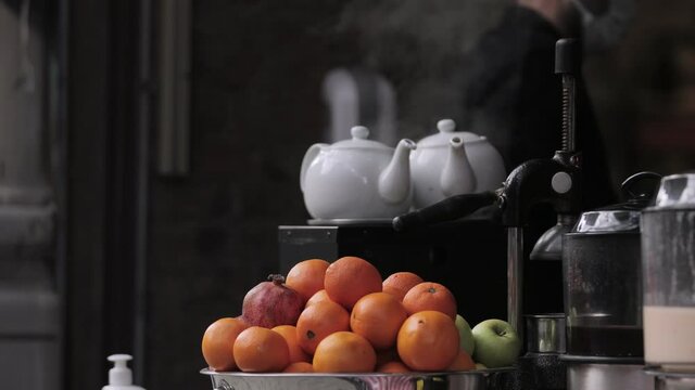 Entrance of a cafe in Istiklal street, Istanbul. Fruits and famous Turkish winter drink '' sahlep '' prepared for customers.