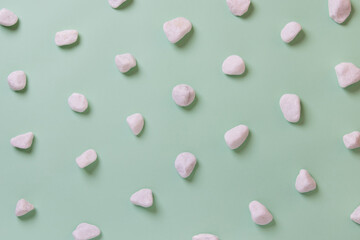 Isometric white stones background on turquoise background