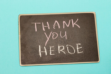 Obraz premium thank you heroes concept on chalkboard