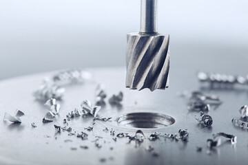 Milling сutter make sink in hole in steel billet. Locksmith work.