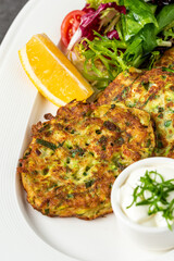 MUCVER. Traditional Turkish Zuccini Mucver. Mucver is a Turkish fritter or pancake, made from grated zucchini.