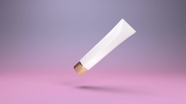 The tube for cream or other cosmetic turns interestingly on a light background. Elegant packaging without a name, can be used to advertise packaging, medicines and cosmetics.