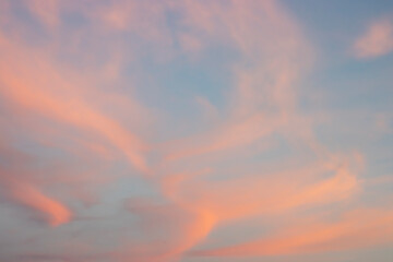 Beautiful clouds lit by the sun at sunset for banner, text or design.
