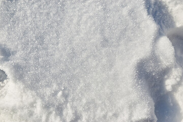 Snow texture background, natural white snow powder in winter