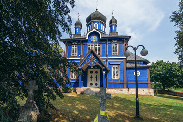Fototapeta na wymiar Wooden Orthodox church of the Protection of the Holy Virgin in Puchly village, Podlasie region of Poland
