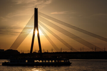 cable stayed bridge silhouette at sunset