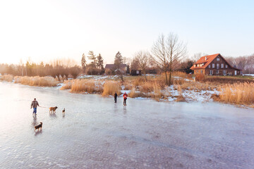 People on fozen river