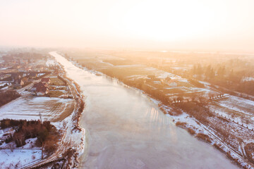 Frozen river sunset