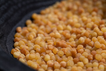 Fregola sarda, a traditional pasta from Sardinia