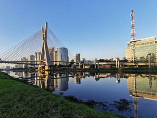 Naklejka premium View of the cable-stayed bridge of the marginal cycle lane at sunset