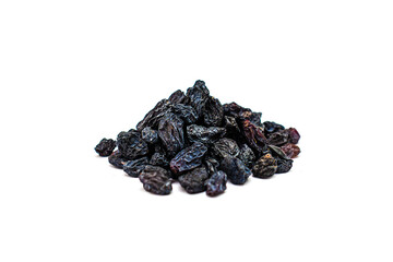 a handful of small black raisins on a white background