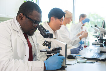 Scientist working in lab. Doctors making medical research. Biotechnology, chemistry, science,...