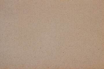 Texture of vintage cardboard, recyclable paper, villi, fluff and other inclusions, grunge background