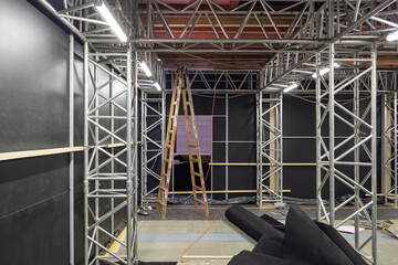 Installation of a concert or exhibition area. Temporary premises made of metal structures....