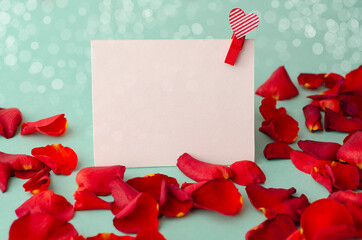 greeting card with a red heart and space for text on a blue background