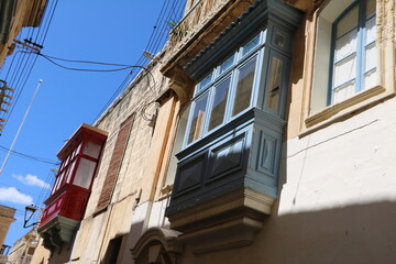 Fototapeta na wymiar Typical balconies in Malta