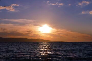 Orange sunset in the sea and reflection